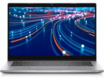Silver laptop open, displaying a vibrant abstract screen of blue and orange light trails.