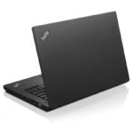 ThinkPad laptop in dark grey, angled with the lid partly open and side ports visible on a white background.