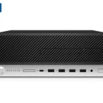 Front view of an HP ProDesk mini desktop with multiple USB ports, audio jack, and power button on a silver fascia; HP logo on left and a black vented top.