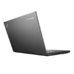 Lenovo laptop angled on a white background, rear corner raised, side ports visible.